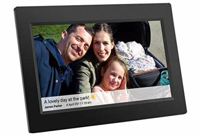 Digital photo frame displaying a family photo with a message.