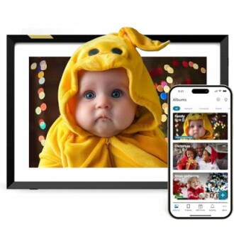 Digital photo frame displaying a baby in yellow costume with a smartphone showing photo albums.