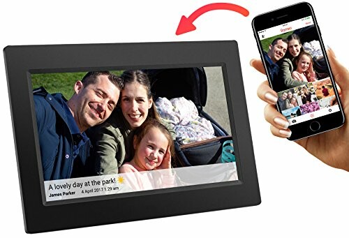 Digital photo frame displaying a family picture, with a hand holding a smartphone showing the same image.