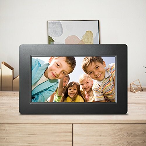 Digital photo frame displaying a group of smiling children