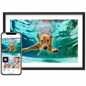 Dog swimming underwater, displayed in a digital frame with a smartphone showing the same image.