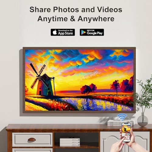 Person sharing photos to a TV with vibrant landscape painting.